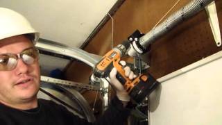 Installing A Garage Door Part 4 Tensioning the EZ Set Torsion Spring [upl. by Letitia]